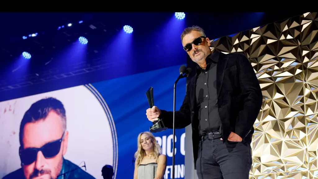 Eric Church accepts the ACM Lifting Lives Award